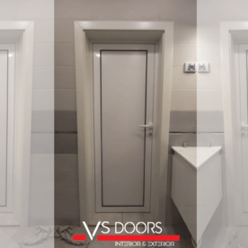 Bathroom door made of Aluminium with decorative MDF panel on the outside